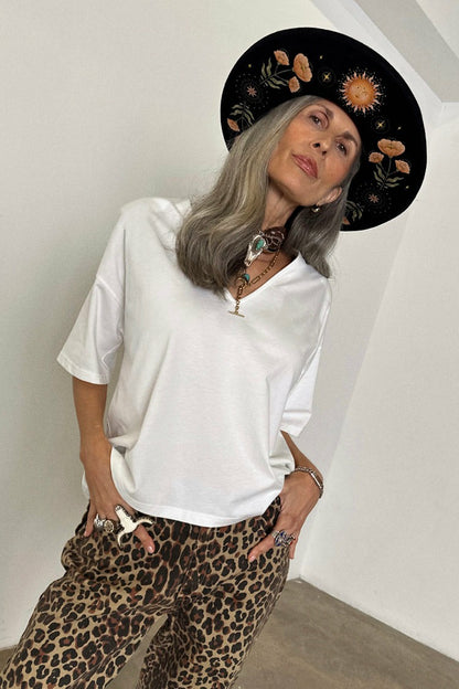 Never Fully Dressed Top Pick - White T-Shirt with Shoulder Pads